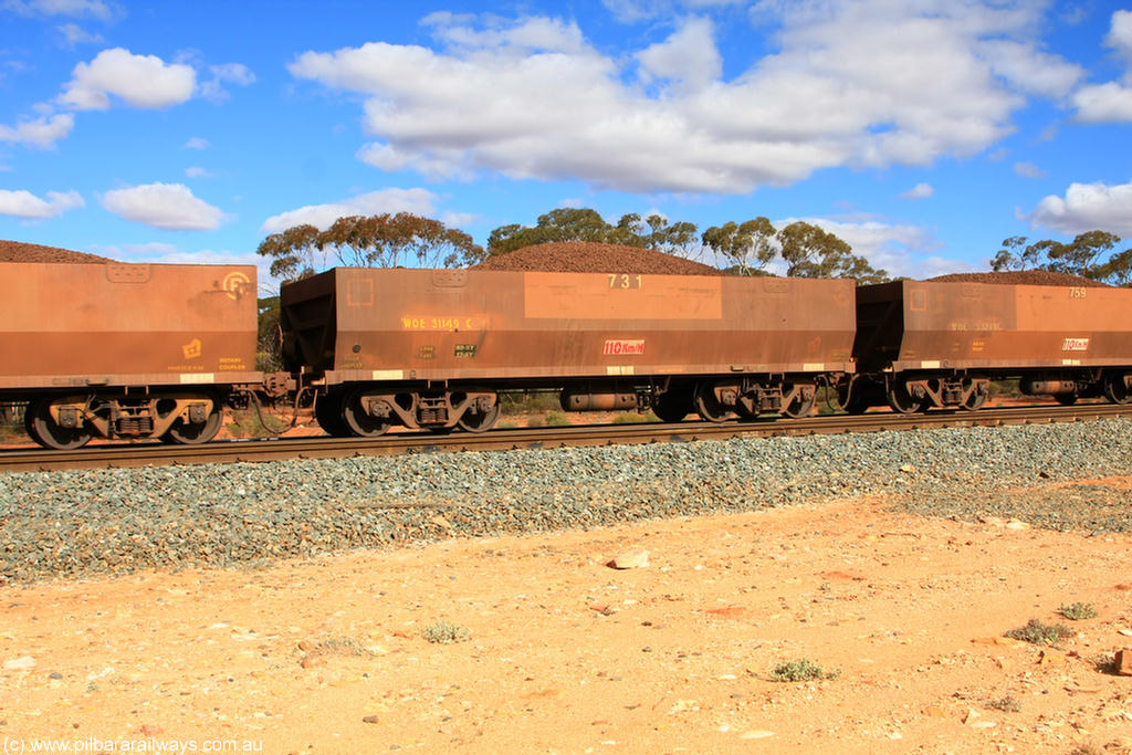 100731 02927
WOE type iron ore waggon WOE 31149 is one of a batch of fifteen built by Goninan WA between April and May 2002 with fleet number 731 for Koolyanobbing iron ore operations, on loaded train 7415 at Binduli Triangle, 31st July 2010.
Keywords: WOE-type;WOE31149;Goninan-WA;