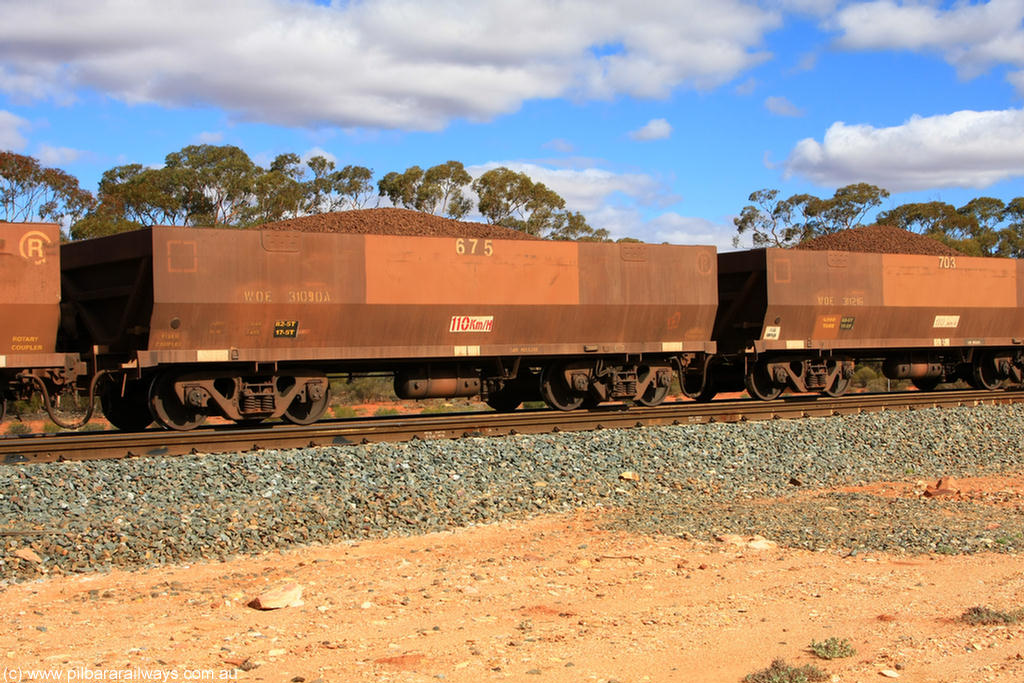 100731 02932
WOE type iron ore waggon WOE 31090 is one of a batch of one hundred and thirty built by Goninan WA between March and August 2001 with serial number 950092-080 and fleet number 675 for Koolyanobbing iron ore operations, on loaded train 7415 at Binduli Triangle, 31st July 2010.
Keywords: WOE-type;WOE31090;Goninan-WA;950092-080;