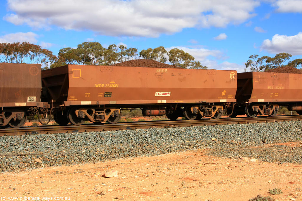 100731 02934
WOE type iron ore waggon WOE 33493 is one of a batch of one hundred and twenty eight built by United Group Rail WA between August 2008 and March 2009 with serial number 950211-033 and fleet number 8992 for Koolyanobbing iron ore operations, on loaded train 7415 at Binduli Triangle, 31st July 2010.
Keywords: WOE-type;WOE33493;United-Group-Rail-WA;950211-033;