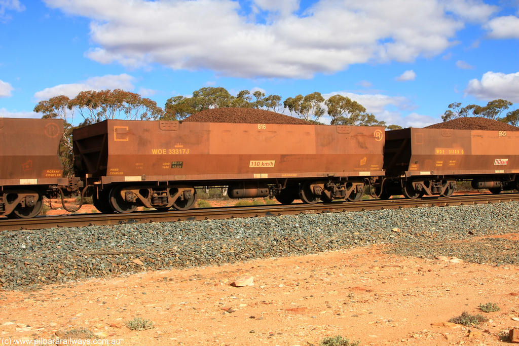 100731 02937
WOE type iron ore waggon WOE 33317 is one of a batch of one hundred and forty one built by United Goninan WA between November 2005 and April 2006 with serial number 950142-022 and fleet number 816 for Koolyanobbing iron ore operations, on loaded train 7415 at Binduli Triangle, 31st July 2010.
Keywords: WOE-type;WOE33317;United-Goninan-WA;950142-022;