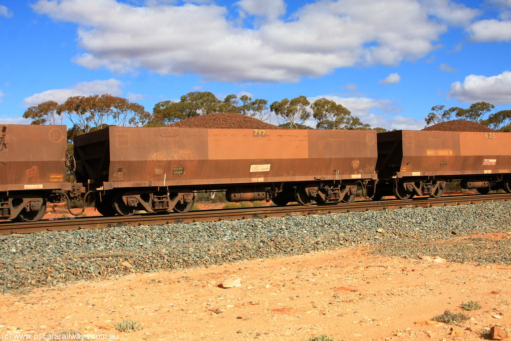 100731 02939
WOE type iron ore waggon WOE 31135 is one of a batch of one hundred and thirty built by Goninan WA between March and August 2001 with serial number 950092-125 and fleet number 717 for Koolyanobbing iron ore operations, on loaded train 7415 at Binduli Triangle, 31st July 2010.
Keywords: WOE-type;WOE31135;Goninan-WA;950092-125;