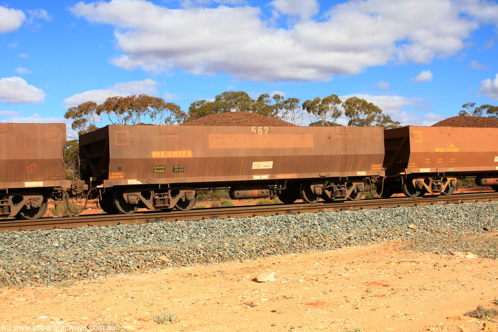 100731 02942
WOE type iron ore waggon WOE 31077 is one of a batch of one hundred and thirty built by Goninan WA between March and August 2001 with serial number 950092-067 and fleet number 662 for Koolyanobbing iron ore operations on loaded train 7415 at Binduli Triangle, 31st July 2010.
Keywords: WOE-type;WOE31077;Goninan-WA;950092-067;