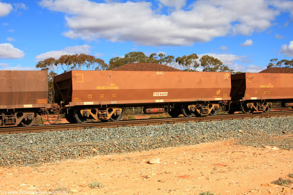 100731 02943
WOE type iron ore waggon WOE 33548 is one of a batch of one hundred and twenty eight built by United Group Rail WA between August 2008 and March 2009 with serial number 950211-088 and fleet number 9043 for Koolyanobbing iron ore operations, on loaded train 7415 at Binduli Triangle, 31st July 2010.
Keywords: WOE-type;WOE33548;United-Group-Rail-WA;950211-088;