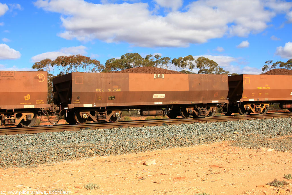 100731 02945
WOE type iron ore waggon WOE 30258 is one of a batch of one hundred and thirty built by Goninan WA between March and August 2001 with serial number 950092-008 and fleet number 608 for Koolyanobbing iron ore operations, on loaded train 7415 at Binduli Triangle, 31st July 2010.
Keywords: WOE-type;WOE30258;Goninan-WA;950092-008;