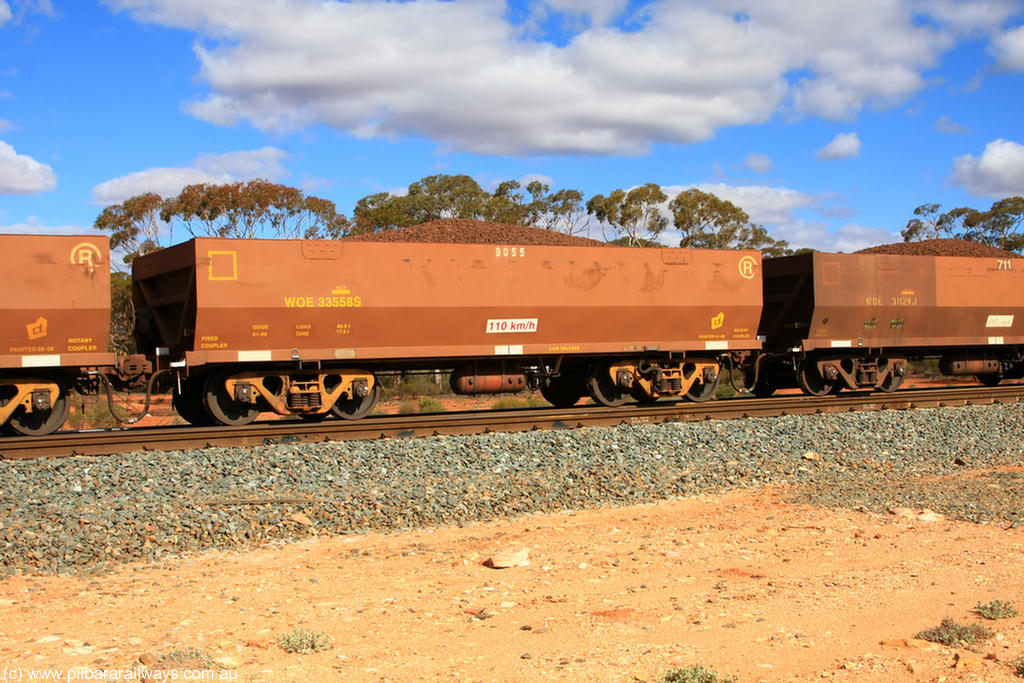 100731 02947
WOE type iron ore waggon WOE 33558 is one of a batch of one hundred and twenty eight built by United Group Rail WA between August 2008 and March 2009 with serial number 950211-098 and fleet number 9055 for Koolyanobbing iron ore operations, on loaded train 7415 at Binduli Triangle, 31st July 2010.
Keywords: WOE-type;WOE33558;United-Group-Rail-WA;950211-098;