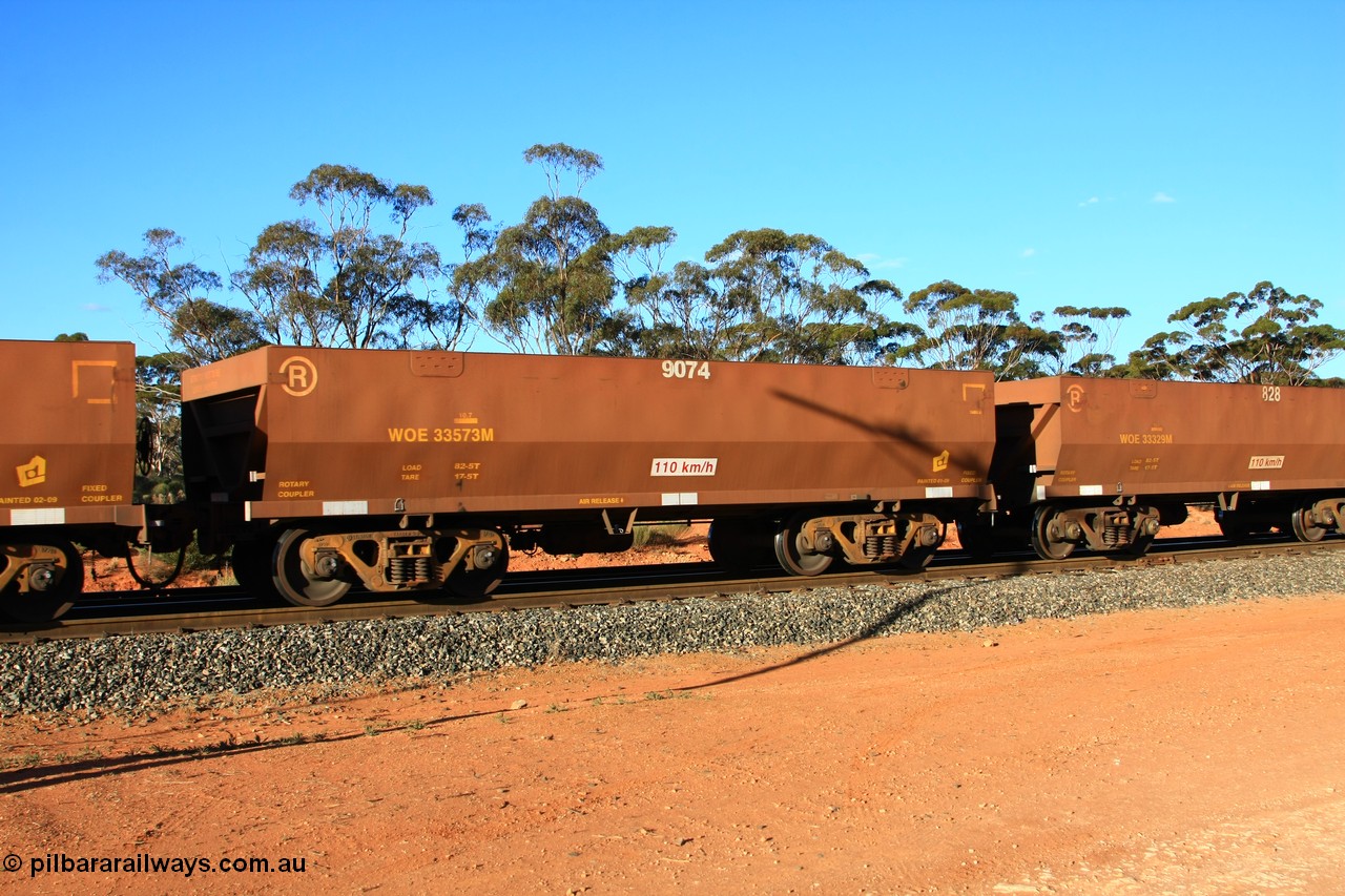 100731 03061
WOE type iron ore waggon WOE 33573 is one of a batch of one hundred and twenty eight built by United Group Rail WA between August 2008 and March 2009 with serial number 950211-113 and fleet number 9074 for Koolyanobbing iron ore operations, empty train arriving at Binduli Triangle, 31st July 2010.
Keywords: WOE-type;WOE33573;United-Group-Rail-WA;950211-113;