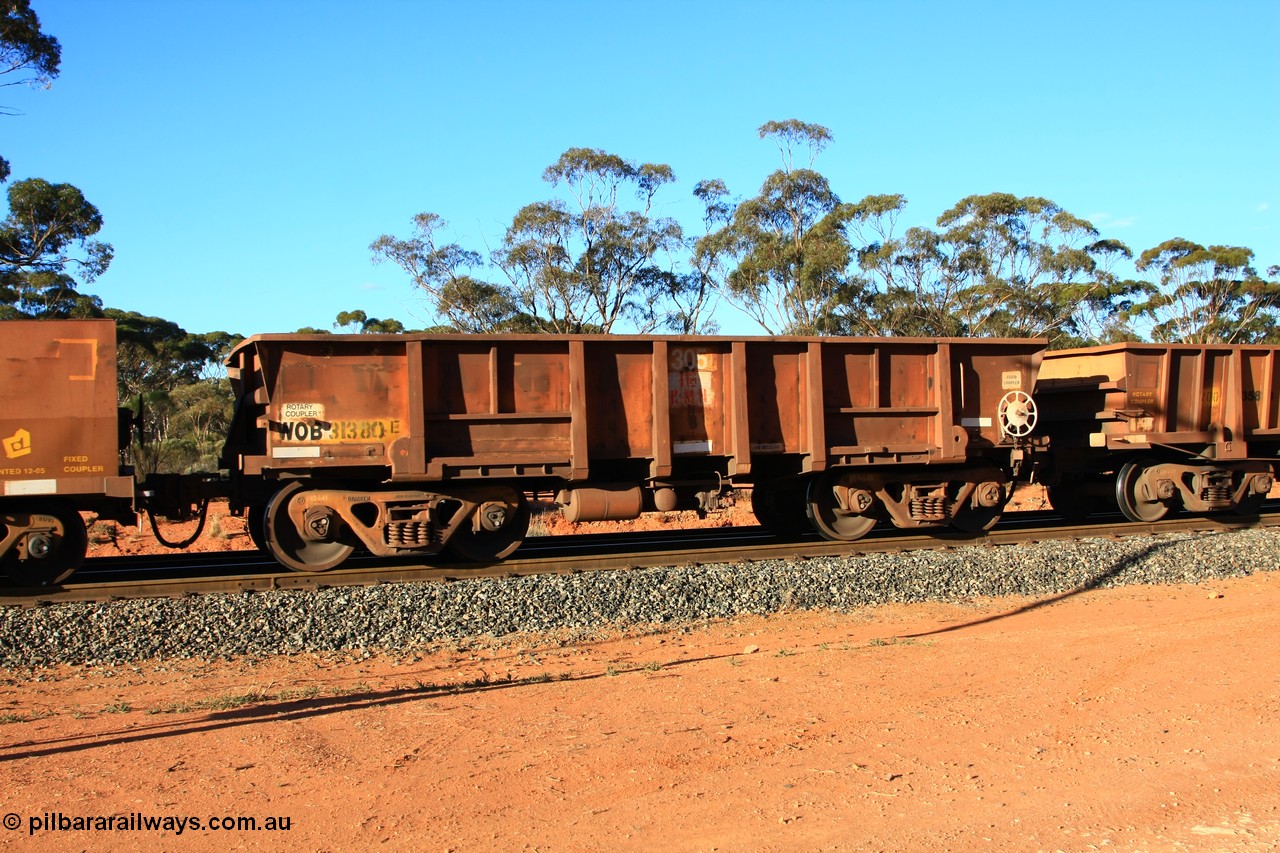 100731 03063
WOB type iron ore waggon WOB 31380 is one of a batch of twenty five built by Comeng WA between 1974 and 1975 and converted from Mt Newman high sided waggons by WAGR Midland Workshops with a capacity of 67 tons with fleet number 305 for Koolyanobbing iron ore operations, empty train arriving at Binduli Triangle, 31st July 2010.
Keywords: WOB-type;WOB31380;Comeng-WA;Mt-Newman-Mining;