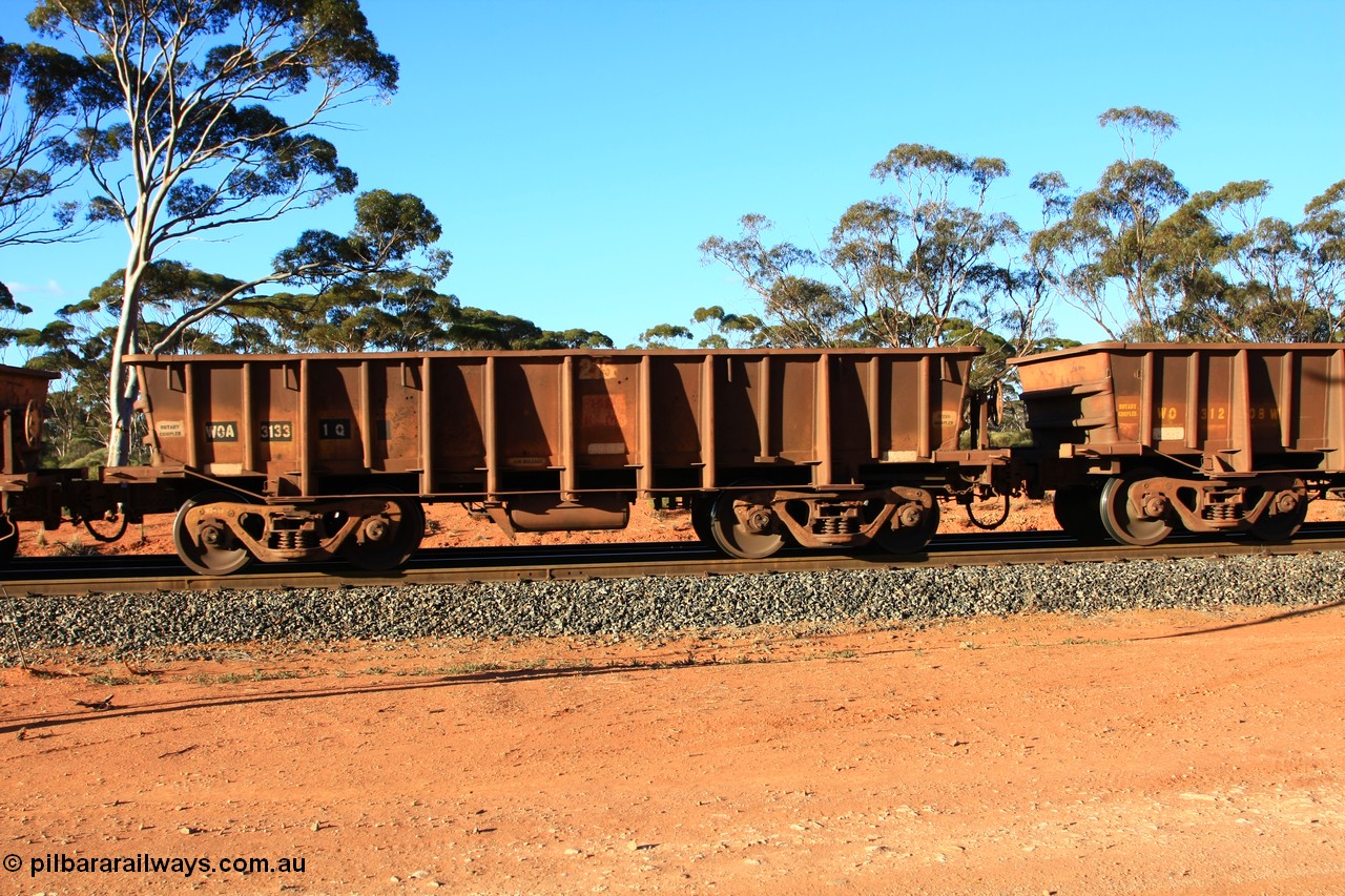100731 03070
WOA type iron ore waggon WOA 31331 is one of a batch of thirty nine built by WAGR Midland Workshops between 1970 and 1971 with fleet number 213 for Koolyanobbing iron ore operations, with a 75 ton and 1018 ft³ capacity, empty train arriving at Binduli Triangle, 31st July 2010.
Keywords: WOA-type;WOA31331;WAGR-Midland-WS;