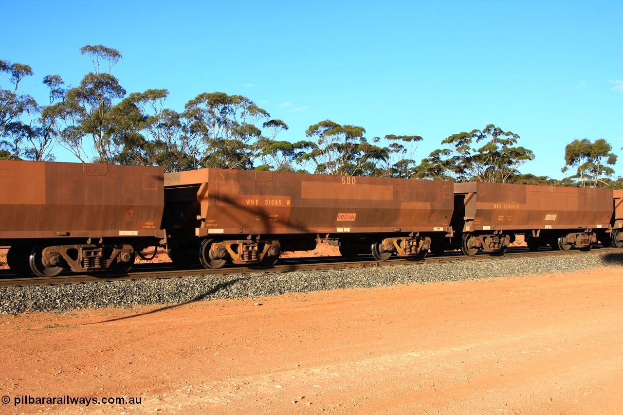 100731 03089
WOE type iron ore waggon WOE 31095 is one of a batch of one hundred and thirty built by Goninan WA between March and August 2001 with serial number 950092-085 and fleet number 680 for Koolyanobbing iron ore operations, empty train arriving at Binduli Triangle, 31st July 2010.
Keywords: WOE-type;WOE31095;Goninan-WA;950092-085;