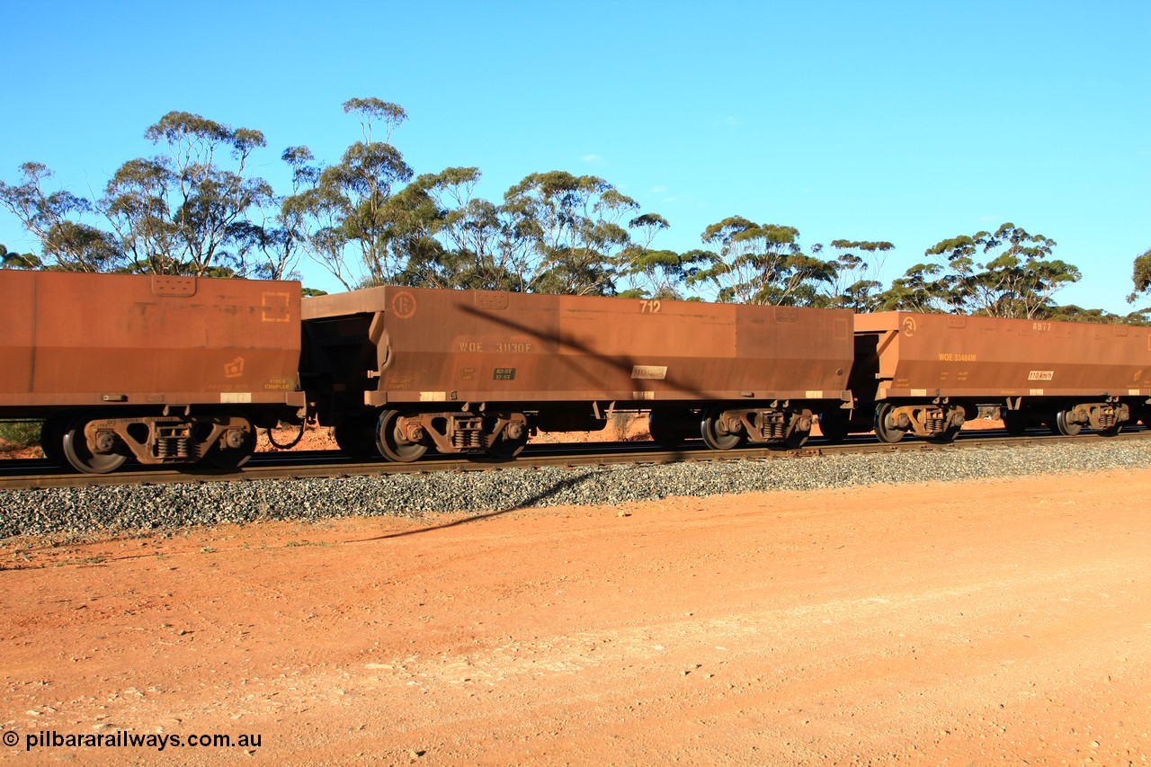 100731 03103
WOE type iron ore waggon WOE 31130 is one of a batch of one hundred and thirty built by Goninan WA between March and August 2001 with serial number 950092-120 and fleet number 712 for Koolyanobbing iron ore operations, empty train arriving at Binduli Triangle, 31st July 2010.
Keywords: WOE-type;WOE31130;Goninan-WA;950092-120;