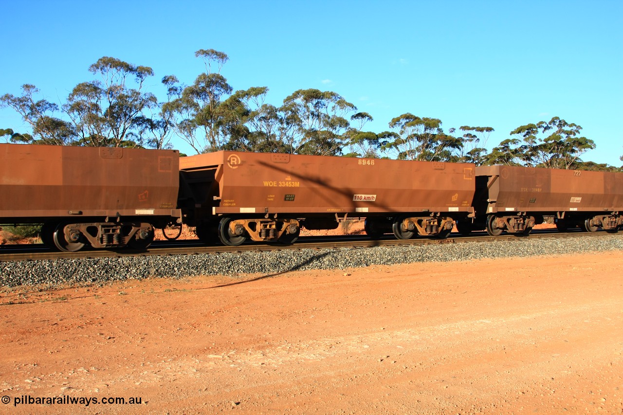 100731 03107
WOE type iron ore waggon WOE 33453 is one of a batch of seventeen built by United Group Rail WA between July and August 2008 with serial number 950209-017 and fleet number 8946 for Koolyanobbing iron ore operations, empty train arriving at Binduli Triangle, 31st July 2010.
Keywords: WOE-type;WOE33453;United-Group-Rail-WA;950209-017;