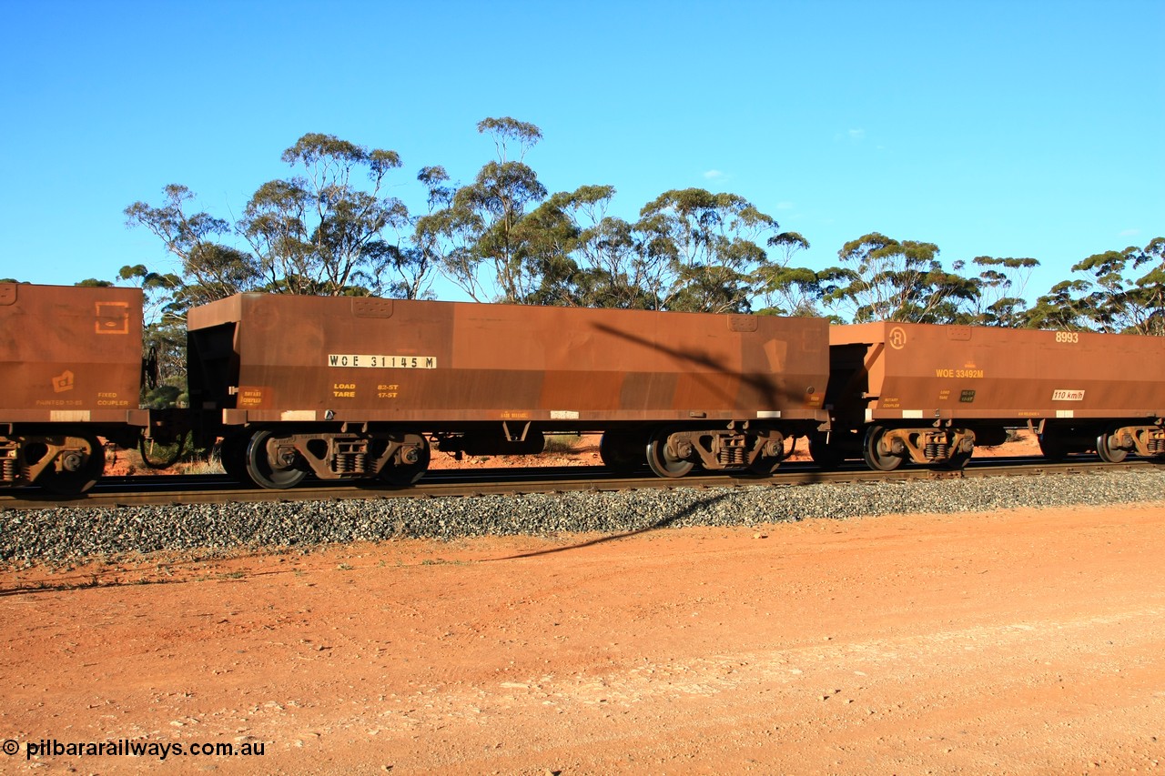 100731 03113
WOE type iron ore waggon WOE 31145 is one of a batch of fifteen built by Goninan WA between April and May 2002 with fleet number 727 for Koolyanobbing iron ore operations, empty train arriving at Binduli Triangle, 31st July 2010.
Keywords: WOE-type;WOE31145;Goninan-WA;
