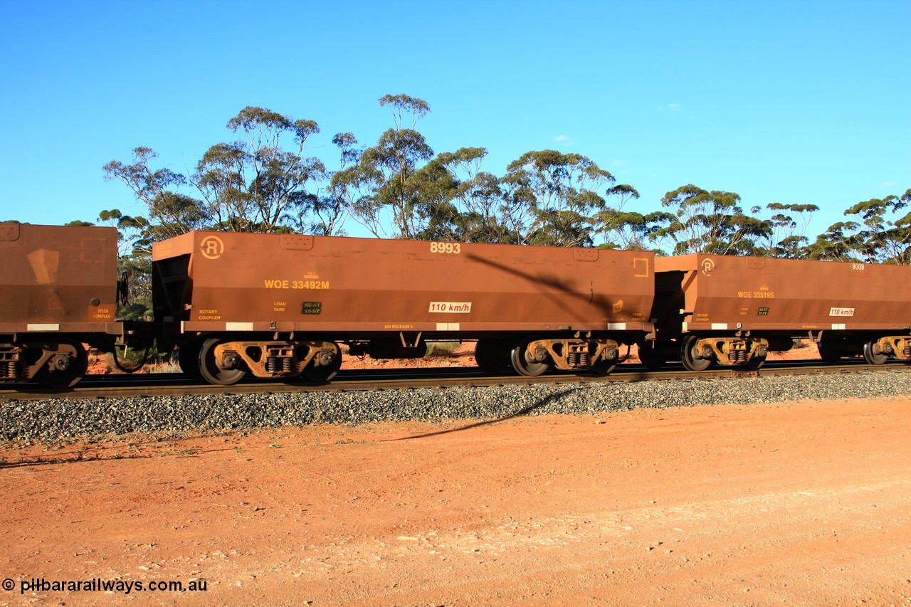 100731 03114
WOE type iron ore waggon WOE 33492 is one of a batch of one hundred and twenty eight built by United Group Rail WA between August 2008 and March 2009 with serial number 950211-032 and fleet number 8993 for Koolyanobbing iron ore operations, empty train arriving at Binduli Triangle, 31st July 2010.
Keywords: WOE-type;WOE33492;United-Group-Rail-WA;950211-032;