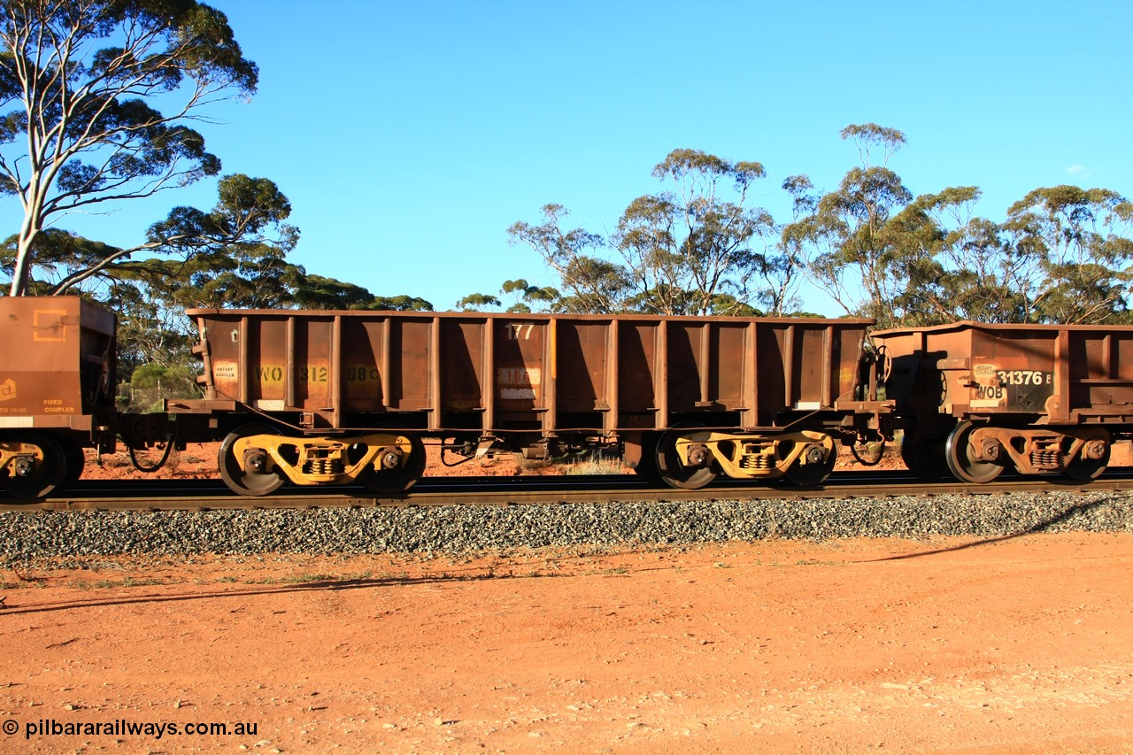 100731 03116
WO type iron ore waggon WO 31298 is one of a batch of fifteen built by WAGR Midland Workshops between July and October 1968 with fleet number 177 for Koolyanobbing iron ore operations, with a 75 ton and 1018 ft³ capacity, empty train arriving at Binduli Triangle, 31st July 2010. This unit was converted to WOC for coal in 1986 till 1994 when it was re-classed back to WO.
Keywords: WO-type;WO31298;WAGR-Midland-WS;