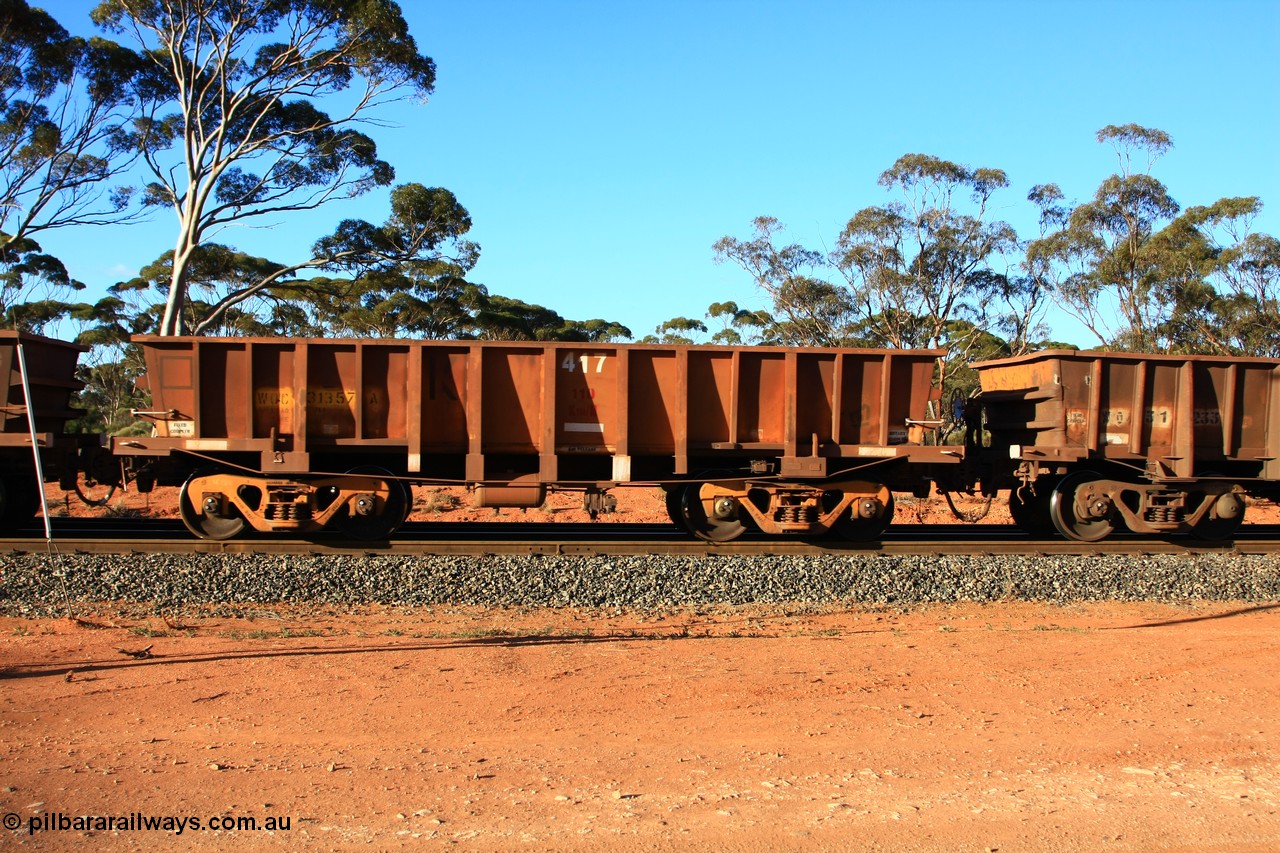 100731 03123
WOC type iron ore waggon WOC 31357 is one of a batch of thirty built by Goninan WA between October 1997 to January 1998 with fleet number 417 for Koolyanobbing iron ore operations with a 75 ton capacity and lettered for KIPL, Koolyanobbing Iron Pty Ltd with the IPL painted over, empty train arriving at Binduli Triangle, 31st July 2010.
Keywords: WOC-type;WOC31357;Goninan-WA;