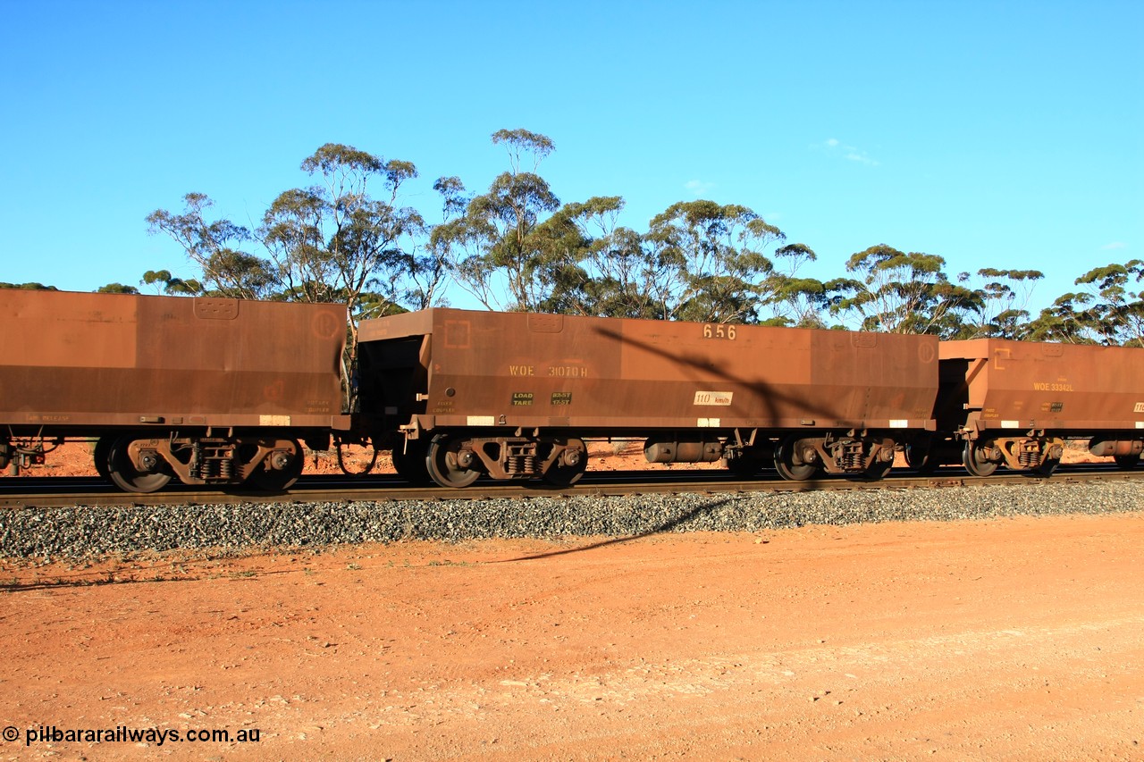 100731 03135
WOE type iron ore waggon WOE 31070 is one of a batch of one hundred and thirty built by Goninan WA between March and August 2001 with serial number 950092-060 and fleet number 656 for Koolyanobbing iron ore operations, empty train arriving at Binduli Triangle, 31st July 2010.
Keywords: WOE-type;WOE31070;Goninan-WA;950092-060;
