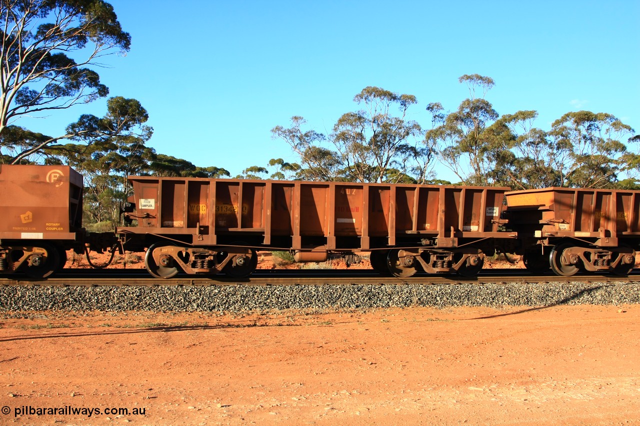100731 03137
WOC type iron ore waggon WOC 31342 is one of a batch of thirty built by Goninan WA between October 1997 to January 1998 with fleet number 402 for Koolyanobbing iron ore operations with a 75 ton capacity and lettered for KIPL, Koolyanobbing Iron Pty Ltd with the IP painted out, empty train arriving at Binduli Triangle, 31st July 2010.
Keywords: WOC-type;WOC31342;Goninan-WA;