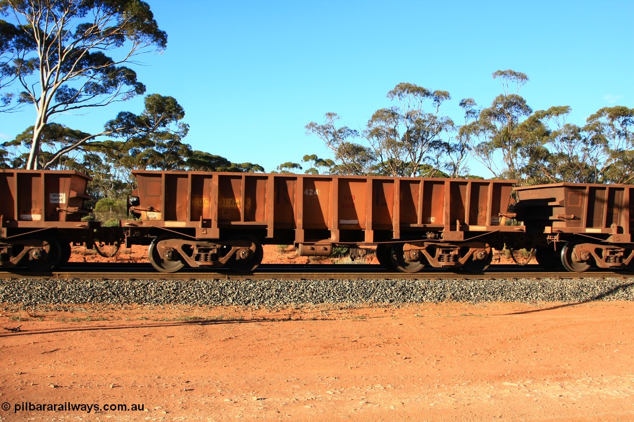 100731 03138
WOC type iron ore waggon WOC 31364 is one of a batch of thirty built by Goninan WA between October 1997 to January 1998 with fleet number 424 for Koolyanobbing iron ore operations with a 75 ton capacity and lettered for KIPL, Koolyanobbing Iron Pty Ltd, with the IP painted over, empty train arriving at Binduli Triangle, 31st July 2010.
Keywords: WOC-type;WOC31364;Goninan-WA;