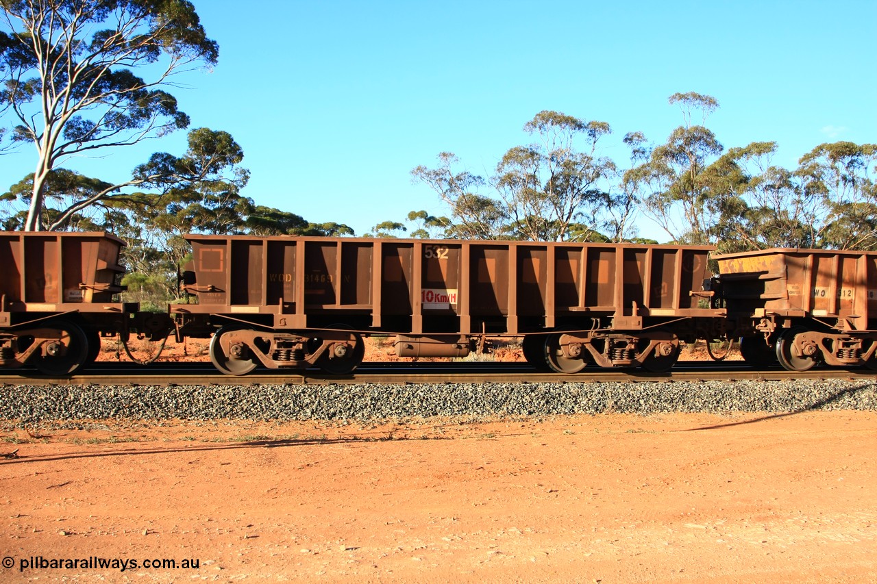 100731 03139
WOD type iron ore waggon WOD 31469 is one of a batch of sixty two built by Goninan WA between April and August 2000 with serial number 950086-041 and fleet number 532 for Koolyanobbing iron ore operations with a 75 ton capacity and build date 06/2000, for Portman Mining to cart their Koolyanobbing iron ore to Esperance, PORTMAN has been painted out, empty train arriving at Binduli Triangle, 31st July 2010.
Keywords: WOD-type;WOD31469;Goninan-WA;950086-041;