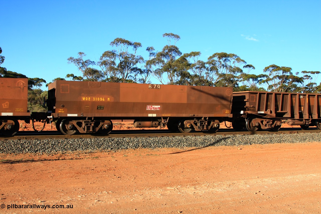 100731 03167
WOE type iron ore waggon WOE 31094 is one of a batch of one hundred and thirty built by Goninan WA between March and August 2001 with serial number 950092-084 and fleet number 679 for Koolyanobbing iron ore operations of 83 tonne load capacity built for Portman Mining with PORTMAN painted out and the load revised down to 82.5 tonnes, empty train arriving at Binduli Triangle, 31st July 2010.
Keywords: WOE-type;WOE31094;Goninan-WA;950092-084;