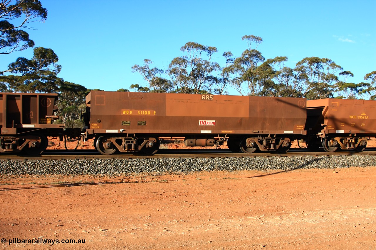 100731 03171
WOE type iron ore waggon WOE 31100 is one of a batch of one hundred and thirty built by Goninan WA between March and August 2001 with serial number 950092-090 and fleet number 685 for Koolyanobbing iron ore operations of 83 tonne load capacity built for Portman Mining with a revised load of 82.5 tonnes and PORTMAN has been painted out, empty train arriving at Binduli Triangle, 31st July 2010.
Keywords: WOE-type;WOE31100;Goninan-WA;950092-090;