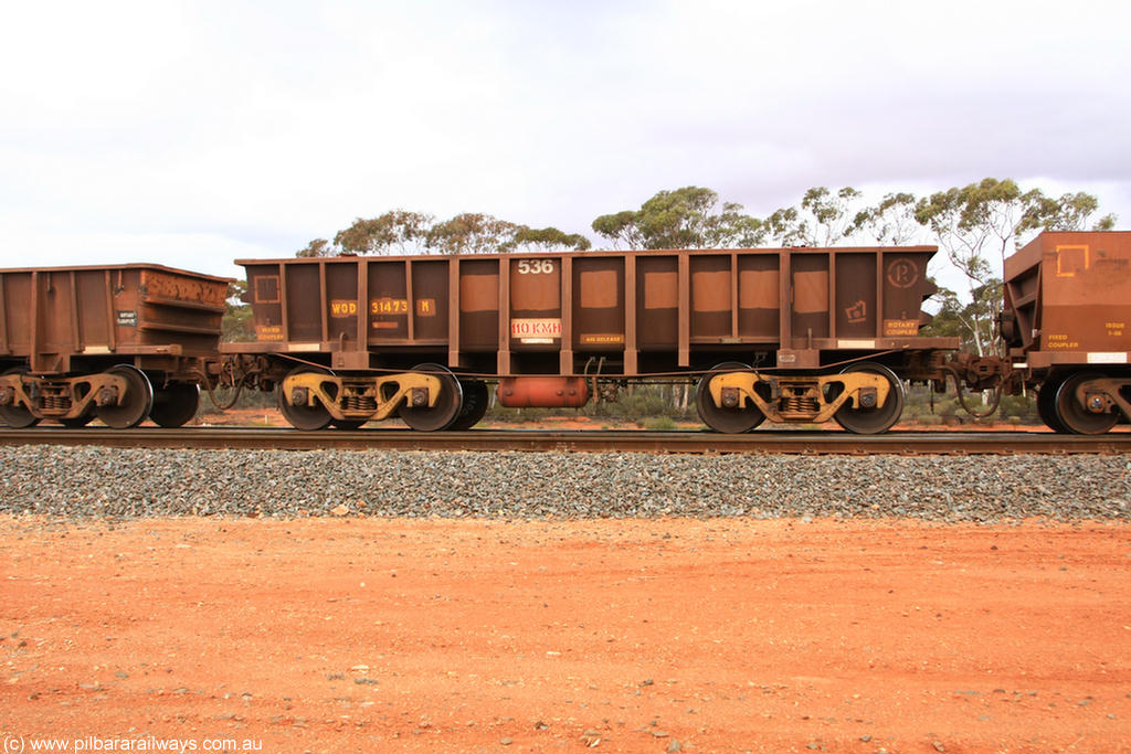 100822 5928
WOD type iron ore waggon WOD 31473 is one of a batch of sixty two built by Goninan WA between April and August 2000 with serial number 950086-045 and fleet number 536 for Koolyanobbing iron ore operations with a 75 ton capacity for Portman Mining to cart their Koolyanobbing iron ore to Esperance, now with PORTMAN painted out, Binduli Triangle 22nd August 2010.
Keywords: WOD-type;WOD31473;Goninan-WA;950086-045;