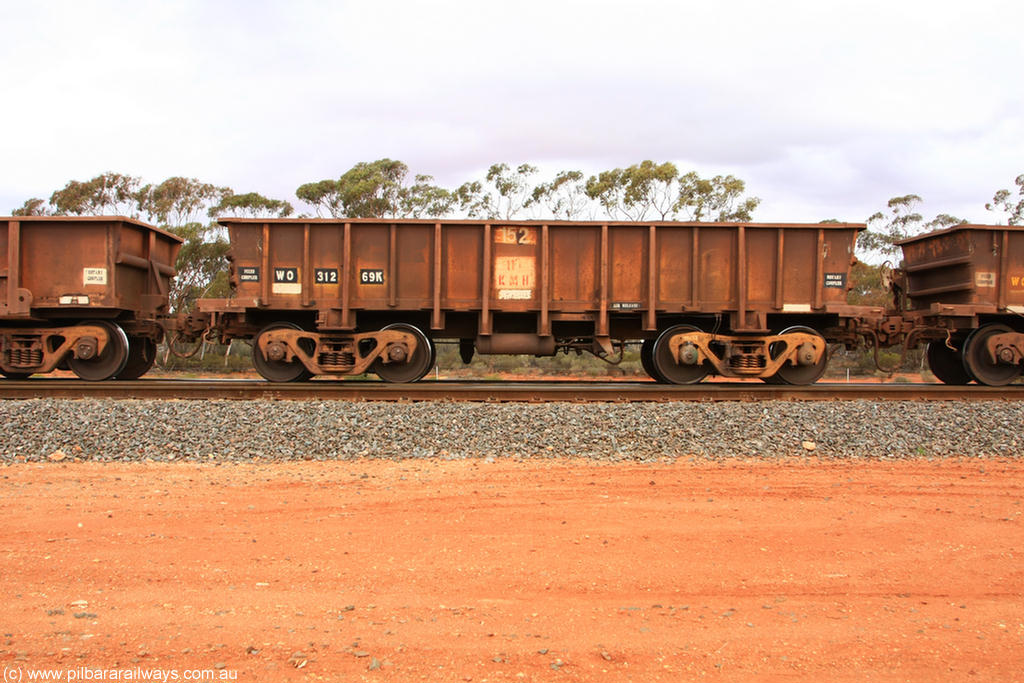 100822 5939
WO type iron ore waggon WO 31269 is one of a batch of eighty six built by WAGR Midland Workshops between 1967 and March 1968 with fleet number 152 for Koolyanobbing iron ore operations, with a 75 ton and 1018 ft³ capacity, Binduli Triangle 22nd August 2010. This unit was converted to WOC for coal in 1986 till 1994 when it was re-classed back to WO.
Keywords: WO-type;WO31269;WAGR-Midland-WS;