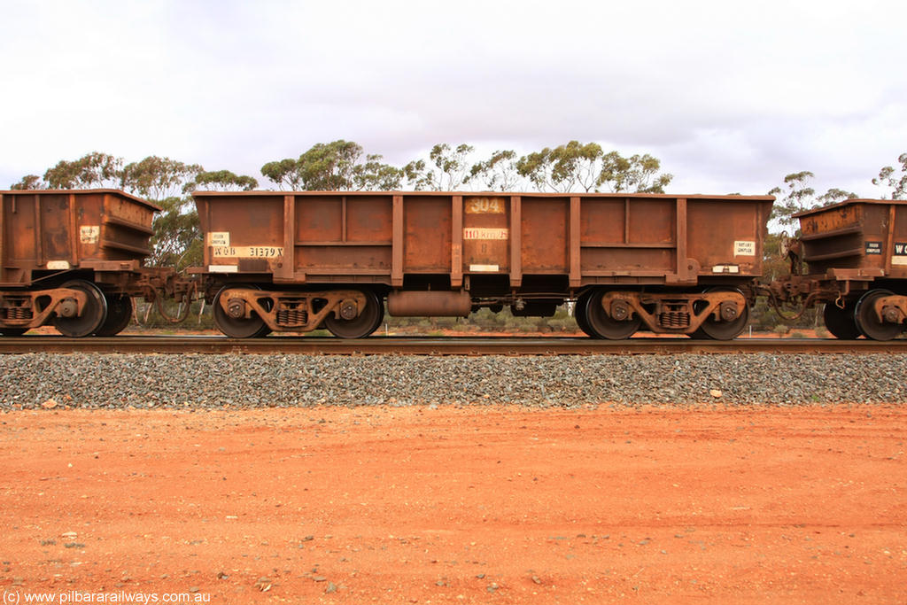 100822 5940
WOB type iron ore waggon WOB 31379 is one of a batch of twenty five built by Comeng WA between 1974 and 1975 and converted from Mt Newman high sided waggons by WAGR Midland Workshops with a capacity of 67 tons with fleet number 304 for Koolyanobbing iron ore operations, the WAGR and Comeng builders plates are visible in the waggon sill, Binduli Triangle 22nd August 2010.
Keywords: WOB-type;WOB31379;Comeng-WA;Mt-Newman-Mining;