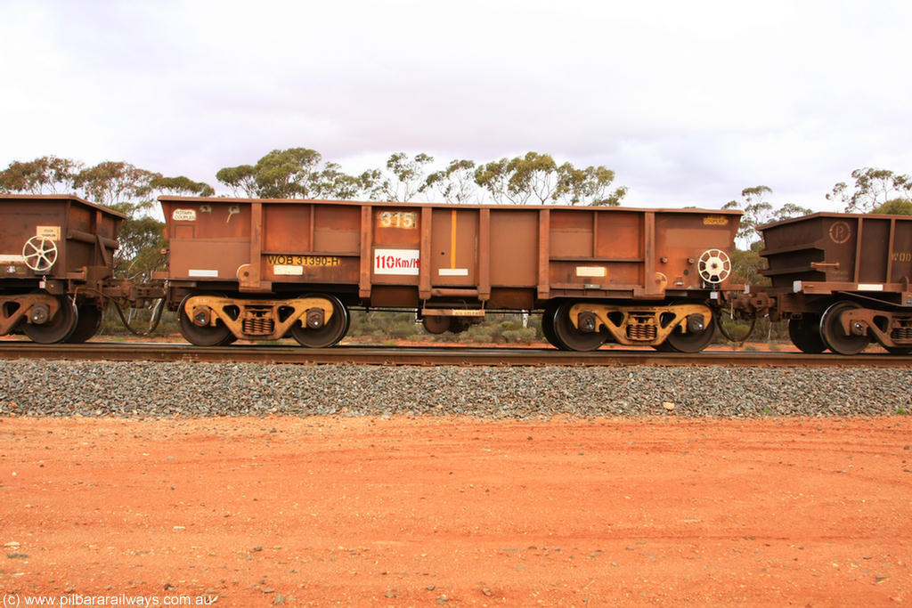 100822 5971
WOB type iron ore waggon WOB 31390 is one of a batch of twenty five built by Comeng WA between 1974 and 1975 and converted from Mt Newman high sided waggons by WAGR Midland Workshops with a capacity of 67 tons with fleet number 315 for Koolyanobbing iron ore operations and is one of the 15 converted to WSM type ballast hoppers by re-fitting the removed top section of the body and fitting bottom discharge doors. Converted back to WOB in 1997. Binduli Triangle, 22nd August 2010.
Keywords: WOB-type;WOB31390;Comeng-WA;WSM-type;Mt-Newman-Mining;
