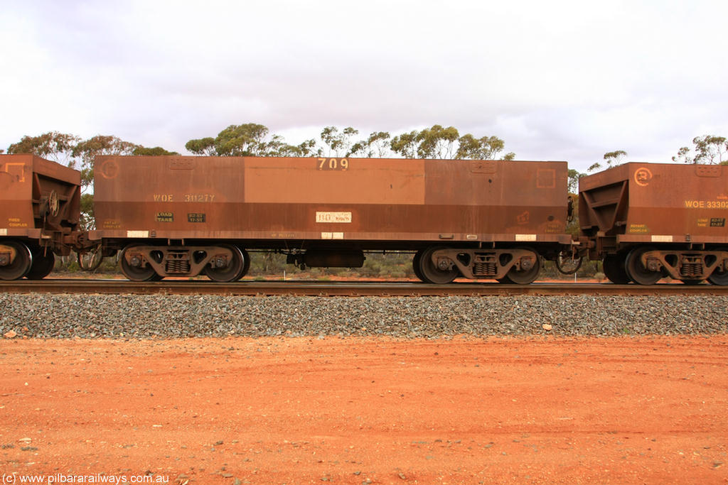 100822 5983
WOE type iron ore waggon WOE 31127 is one of a batch of one hundred and thirty built by Goninan WA between March and August 2001 with serial number 950092-117 and fleet number 709 for Koolyanobbing iron ore operations, Binduli Triangle 22nd August 2010.
Keywords: WOE-type;WOE31127;Goninan-WA;950092-117;