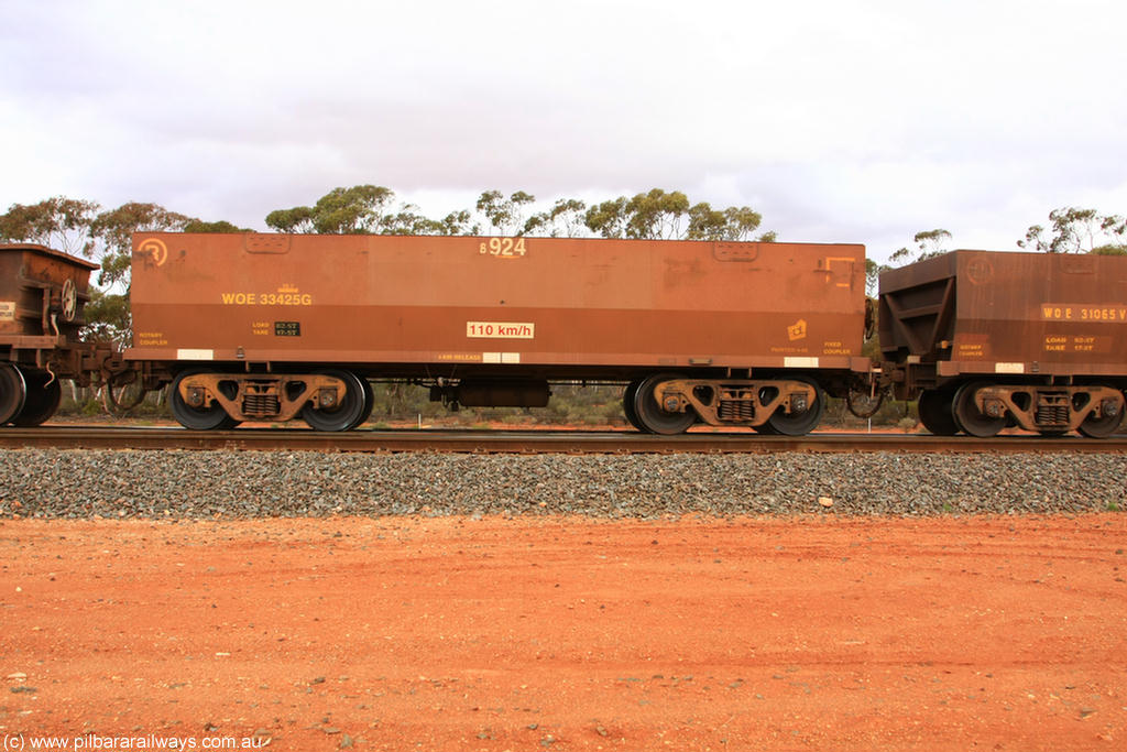 100822 6015
WOE type iron ore waggon WOE 33425 is one of a batch of one hundred and forty one built by United Group Rail WA between November 2005 and April 2006 with serial number 950142-130 and fleet number 8924 for Koolyanobbing iron ore operations, Binduli Triangle 22nd August 2010.
Keywords: WOE-type;WOE33425;United-Group-Rail-WA;950142-130;