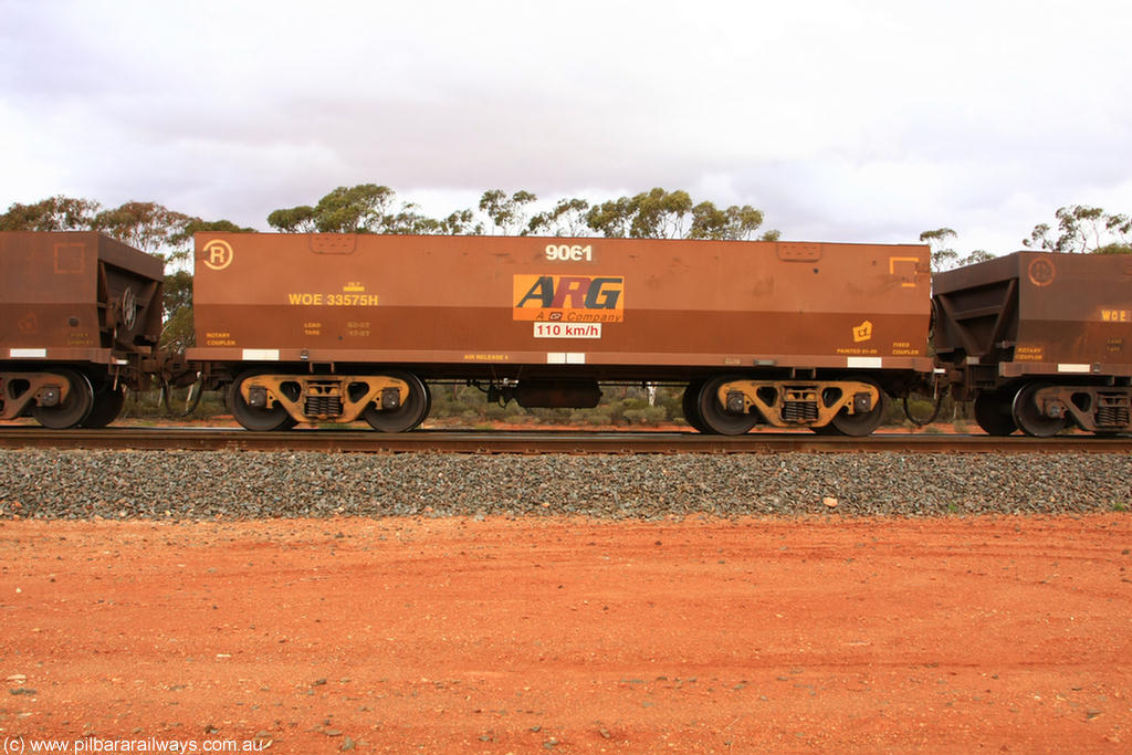 100822 6020
WOE type iron ore waggon WOE 33575 is one of a batch of one hundred and twenty eight built by United Group Rail WA between August 2008 and March 2009 with serial number 950211-115 and fleet number 9061 for Koolyanobbing iron ore operations, Binduli Triangle 22nd August 2010.
Keywords: WOE-type;WOE33575;United-Group-Rail-WA;950211-115;