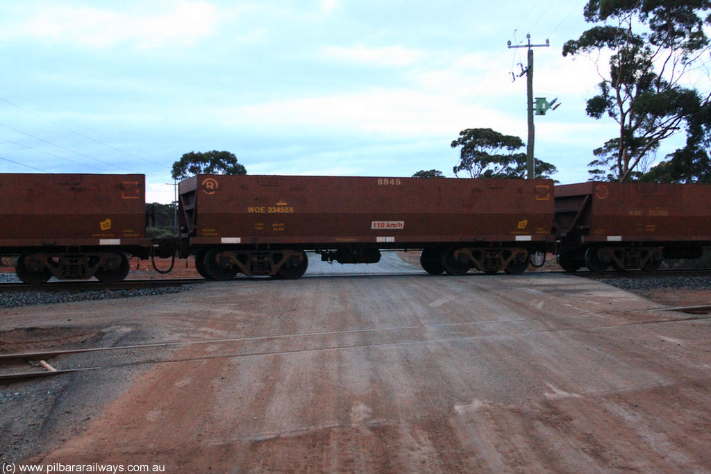 100822 6237
WOE type iron ore waggon WOE 33450 is one of a batch of seventeen built by United Group Rail WA between July and August 2008 with serial number 950209-014 and fleet number 8945 for Koolyanobbing iron ore operations, on empty train 1416 at Hampton, 22nd August 2010.
Keywords: WOE-type;WOE33450;United-Group-Rail-WA;950209-014;