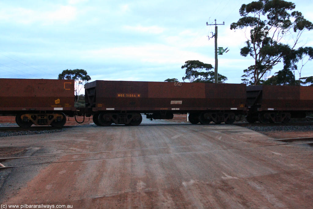 100822 6254
WOE type iron ore waggon WOE 31064 is one of a batch of one hundred and thirty built by Goninan WA between March and August 2001 with serial number 950092-054 and fleet number 650 for Koolyanobbing iron ore operations, on empty train 1416 at Hampton, 22nd August 2010.
Keywords: WOE-type;WOE31064;Goninan-WA;950092-054;