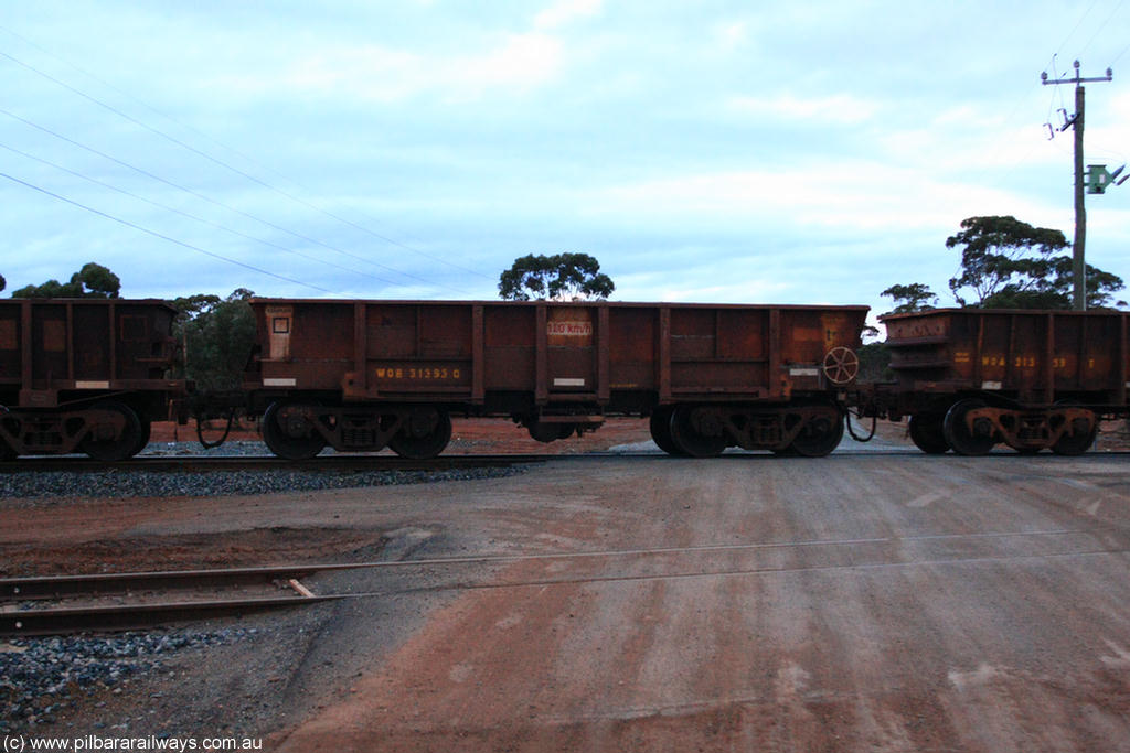 100822 6260
WOB type iron ore waggon WOB 31393 is one of a batch of twenty five built by Comeng WA between 1974 and 1975 and converted from Mt Newman high sided waggons by WAGR Midland Workshops with a capacity of 67 tons with fleet number 318 for Koolyanobbing iron ore operations. This waggon was also converted to a WSM type ballast hopper by re-fitting the cut down top section and having bottom discharge doors fitted, converted back to WOB in 1998, on empty train 1416 at Hampton, 22nd August 2010.
Keywords: WOB-type;WOB31393;Comeng-WA;WSM-type;Mt-Newman-Mining;