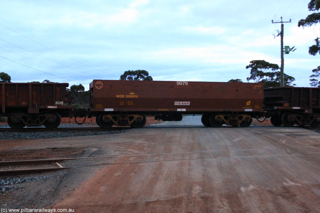 100822 6266
WOE type iron ore waggon WOE 33583 is one of a batch of one hundred and twenty eight built by United Group Rail WA between August 2008 and March 2009 with serial number 950211-123 and fleet number 9079 for Koolyanobbing iron ore operations, on empty train 1416 at Hampton, 22nd August 2010.
Keywords: WOE-type;WOE33583;United-Group-Rail-WA;950211-123;