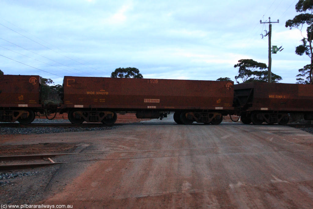 100822 6307
WOE type iron ore waggon WOE 33427 is one of a batch of one hundred and forty one built by United Group Rail WA between November 2005 and April 2006 with serial number 950142-132 and fleet number 8926 for Koolyanobbing iron ore operations, on empty train 1416 at Hampton, 22nd August 2010.
Keywords: WOE-type;WOE33427;United-Group-Rail-WA;950142-132;