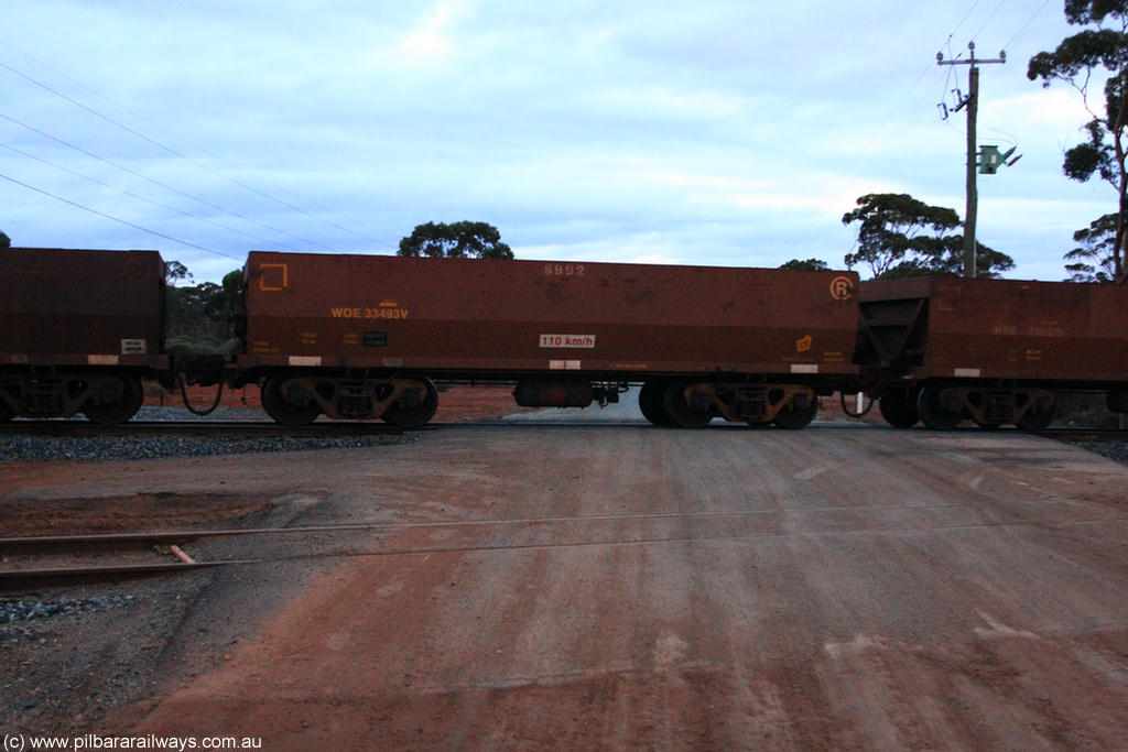 100822 6315
WOE type iron ore waggon WOE 33493 is one of a batch of one hundred and twenty eight built by United Group Rail WA between August 2008 and March 2009 with serial number 950211-033 and fleet number 8992 for Koolyanobbing iron ore operations, on empty train 1416 at Hampton, 22nd August 2010.
Keywords: WOE-type;WOE33493;United-Group-Rail-WA;950211-033;