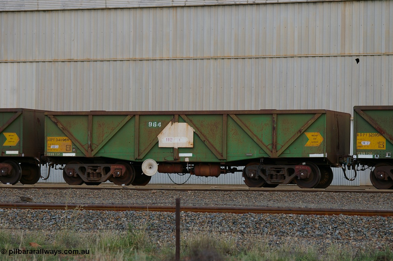 PD 12847
West Kalgoorlie, AOPY 34096 with fleet number 964 and of the drop floor type with disc type handbrake wheel, one of seventy ex ANR coal waggons rebuilt from AOKF type by Bluebird Engineering SA in service with ARG on Koolyanobbing iron ore trains. They used to be three metres longer and originally built by Metropolitan Cammell Britain as GB type in 1952-55, seen here in a rake with sister waggons.
Keywords: Peter-D-Image;AOPY-type;AOPY34096;Bluebird-Engineering-SA;Metropolitan-Cammell-Britain;GB-type;