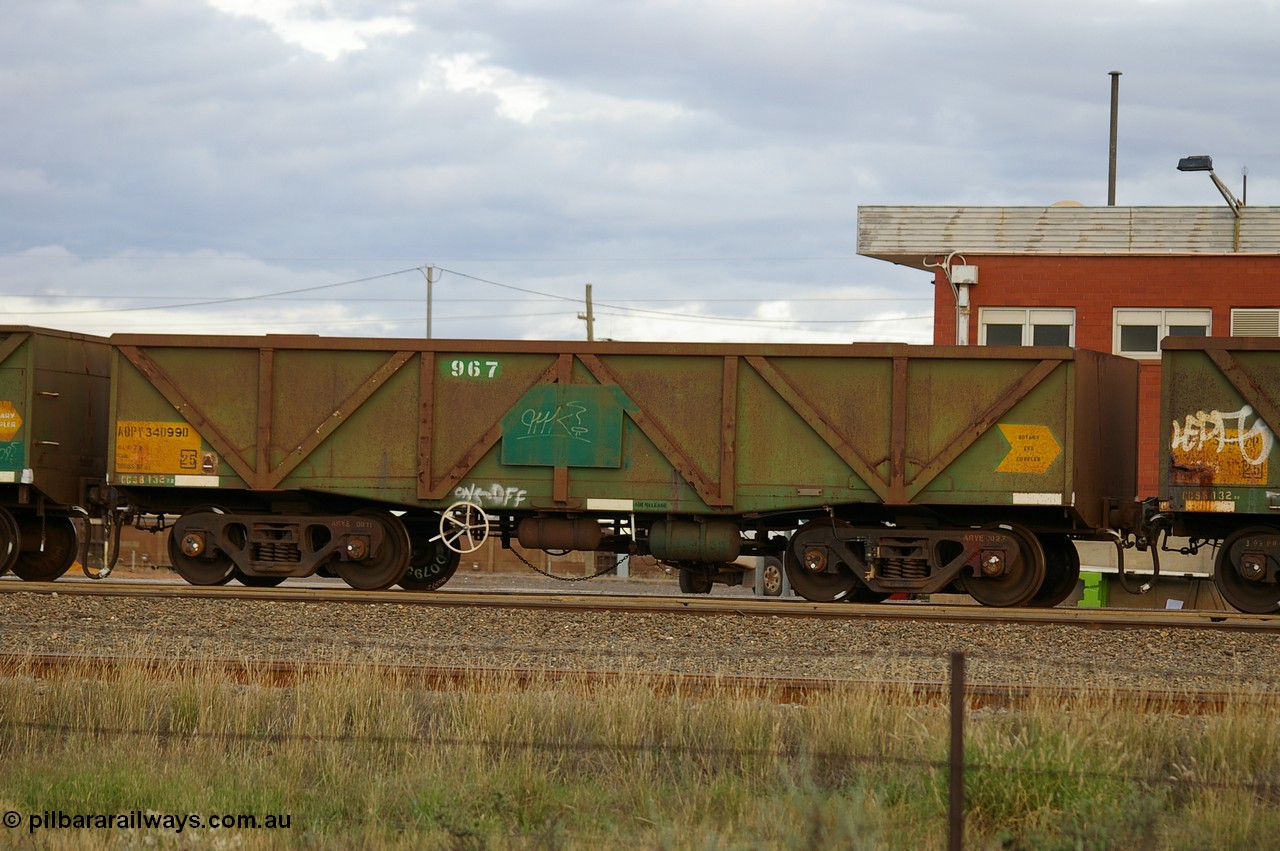PD 12850
West Kalgoorlie, AOPY 34099 with fleet number 967 and of the drop floor type, one of seventy ex ANR coal waggons rebuilt from AOKF type by Bluebird Engineering SA in service with ARG on Koolyanobbing iron ore trains. They used to be three metres longer and originally built by Metropolitan Cammell Britain as GB type in 1952-55, seen here in a rake with sister waggons.
Keywords: Peter-D-Image;AOPY-type;AOPY34099;Bluebird-Engineering-SA;Metropolitan-Cammell-Britain;GB-type;