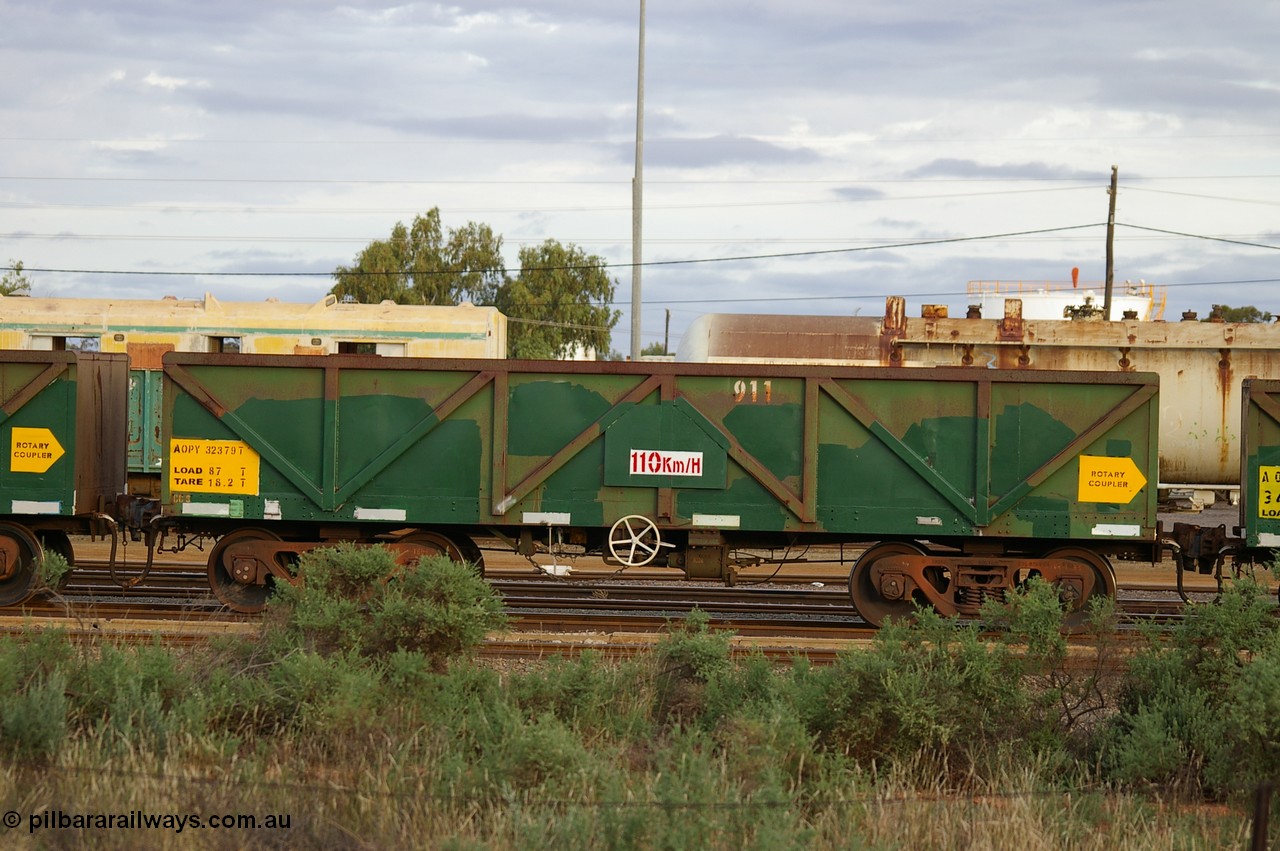PD 12864
West Kalgoorlie, AOPY 32379 with fleet number 911, one of seventy ex ANR coal waggons rebuilt from AOKF type by Bluebird Engineering SA in service with ARG on Koolyanobbing iron ore trains. They used to be three metres longer and originally built by Metropolitan Cammell Britain as GB type in 1952-55, seen here in a rake with sister waggons.
Keywords: Peter-D-Image;AOPY-type;AOPY32379;Bluebird-Engineering-SA;Metropolitan-Cammell-Britain;GB-type;