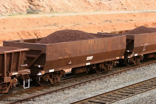 060116 2679
WOE type iron ore waggon WOE 30252 is one of a batch of one hundred and thirty built by Goninan WA between March and August 2001 with serial number 950092-002 and fleet number 602 for Koolyanobbing iron ore operations with a built date April 2001 in the current style of 83 tonne load capacity WOE type waggon built for Portman Mining on Koolyanobbing iron ore train service, West Kalgoorlie 16th January 2006.
Keywords: WOE-type;WOE30252;Goninan-WA;950092-002;