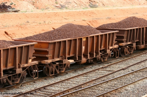 060116 2689
WOC type iron ore waggon WOC 31360 is one of a batch of thirty built by Goninan WA between October 1997 to January 1998 with fleet number 420 for Koolyanobbing iron ore operations with a 75 ton capacity and lettered for KIPL, Koolyanobbing Iron Pty Ltd, seen here loaded with lump ore, West Kalgoorlie January 16, 2006.
Keywords: WOC-type;WOC31360;Goninan-WA;
