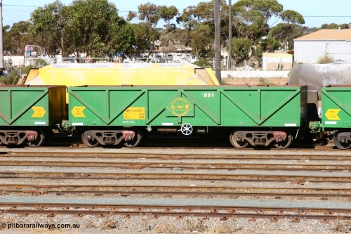 060528 4505
West Kalgoorlie, AOPY 34082, fleet number 951, one of seventy ex ANR coal waggons rebuilt from AOKF type by Bluebird Engineering SA in service with ARG on Koolyanobbing iron ore trains. They used to be three metres longer and originally built by Metropolitan Cammell Britain as GB type in 1952-55, May 28, 2006.
Keywords: AOPY-type;AOPY34082;Bluebird-Engineering-SA;Metropolitan-Cammell-Britain;GB-type;