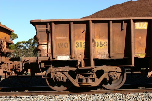 060528 4569
WO type iron ore waggon WO 31205 is one of a batch of eighty six built by WAGR Midland Workshops between 1967 and March 1968 with fleet number 102 for Koolyanobbing iron ore operations, with a 75 ton and 1018 ft.³ capacity, seen here loaded with fines at Bonnie Vale, May 28, 2006. This unit was converted to WOS superphosphate in the late 1980s till 1994 when it was re-classed back to WO.
Keywords: WO-type;WO31205;WAGR-Midland-WS;WOS-type;