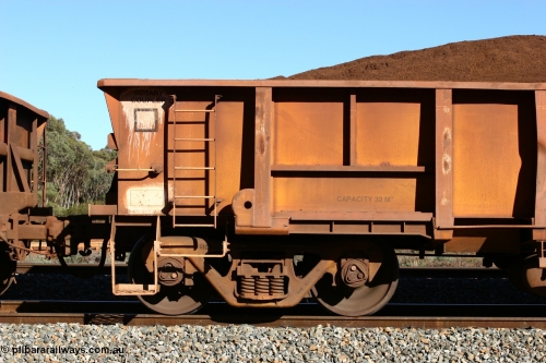 060528 4583
WOB type iron ore waggon WOB 31392 is one of a batch of twenty five built by Comeng WA between 1974 and 1975 and converted from Mt Newman high sided waggons by WAGR Midland Workshops with a capacity of 67 tons with fleet number 317 for Koolyanobbing iron ore operations, this waggon was converted to a WSM ballast hopper, then converted back to a WOB by WAGR Midland Workshops, and started life as a Comeng built Mt Newman Mining ore waggon in 1974. It was originally numbered 31391 by WAGR, seen here loaded with fines at Bonnie Vale, May 28, 2006.
Keywords: WOB-type;WOB31392;Comeng-WA;WSM-type;Mt-Newman-Mining;