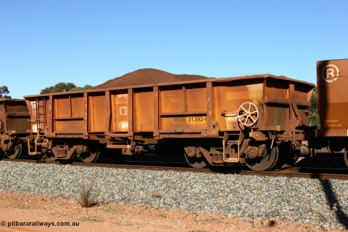 060528 4584
WOB type iron ore waggon WOB 31392 is one of a batch of twenty five built by Comeng WA between 1974 and 1975 and converted from Mt Newman high sided waggons by WAGR Midland Workshops with a capacity of 67 tons with fleet number 317 for Koolyanobbing iron ore operations, then the top section re-fitted and converted to a WSM ballast hopper, then converted back to a WOB by WAGR Midland Workshops. It was originally numbered 31391 by WAGR, seen here loaded with fines at Bonnie Vale, May 28, 2006.
Keywords: WOB-type;WOB31392;Comeng-WA;WSM-type;Mt-Newman-Mining;