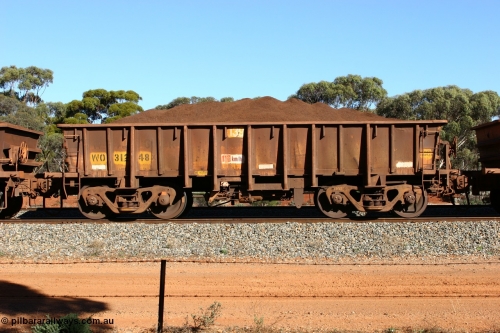060528 4594
WO type iron ore waggon WO 31248 is one of a batch of eighty six built by WAGR Midland Workshops between 1967 and March 1968 with fleet number 139 for Koolyanobbing iron ore operations, with a 75 ton and 1018 ft³ capacity, loaded with fines seen here at Bonnie Vale, May 28, 2006. This unit was converted to WOG for gypsum in late 1980s till 1990 then reclassed to WOS for superphosphate before being re-classed back to WO in 1994.
Keywords: WO-type;WO31248;WAGR-Midland-WS;