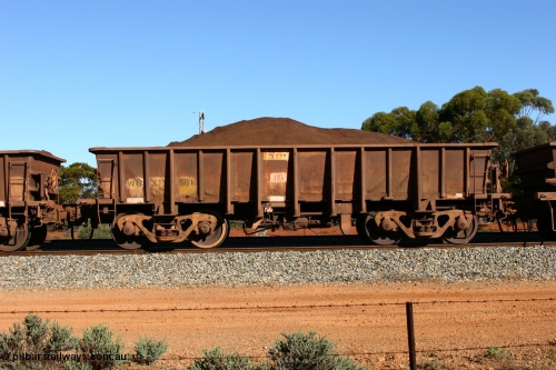 060528 4598
WO type iron ore waggon WO 31296 is one of a batch of fifteen built by WAGR Midland Workshops between July and October 1968 with fleet number 175 for Koolyanobbing iron ore operations, with a 75 ton and 1018 ft³ capacity, loaded with fines seen here at Bonnie Vale, May 28, 2006. This unit was converted to WOC for coal in 1986 till 1994 when it was re-classed back to WO.
Keywords: WO-type;WO31296;WAGR-Midland-WS;