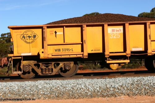 060530 4970
WOB type iron ore waggon WOB 31395 is one of a batch of twenty five built by Comeng WA between 1974 and 1975 and converted from Mt Newman high sided waggons by WAGR Midland Workshops with a capacity of 67 tons with fleet number 325 for Koolyanobbing iron ore operations. This waggon was also converted to a WSM type ballast hopper by re-fitting the cut down top section and having bottom discharge doors fitted, converted back to WOB in 1997, and this is the first one to be repainted in ARG yellow, loaded with lump ore, Binduli 30th May 2006.
Keywords: WOB-type;WOB31395;Comeng-WA;WSM-type;Mt-Newman-Mining;